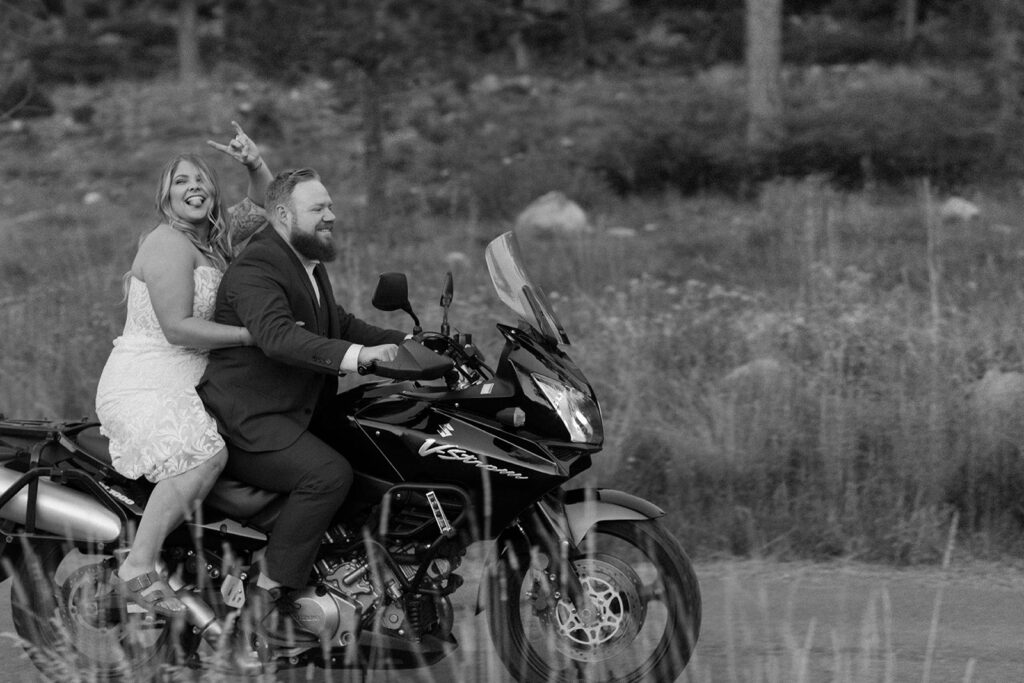 Man and woman in white dress riding a motorcycle at Fallen Leaf Lake Nevada