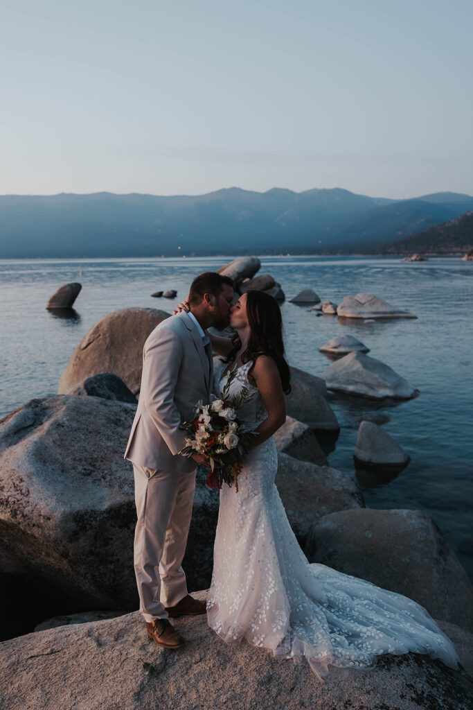 Couple kissing at sand harbor state park